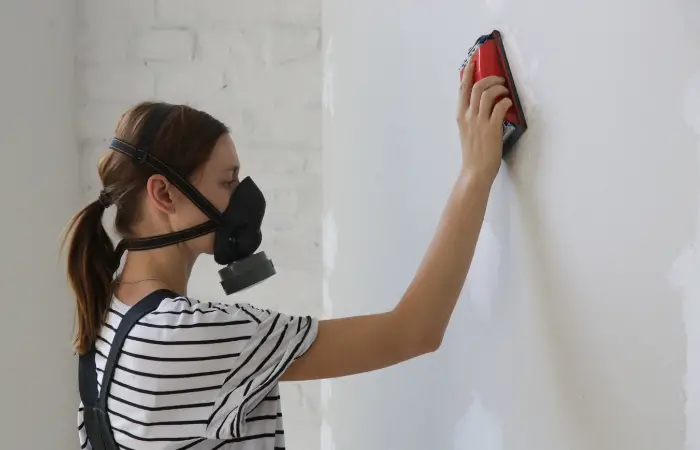 Sanding Plaster Wall